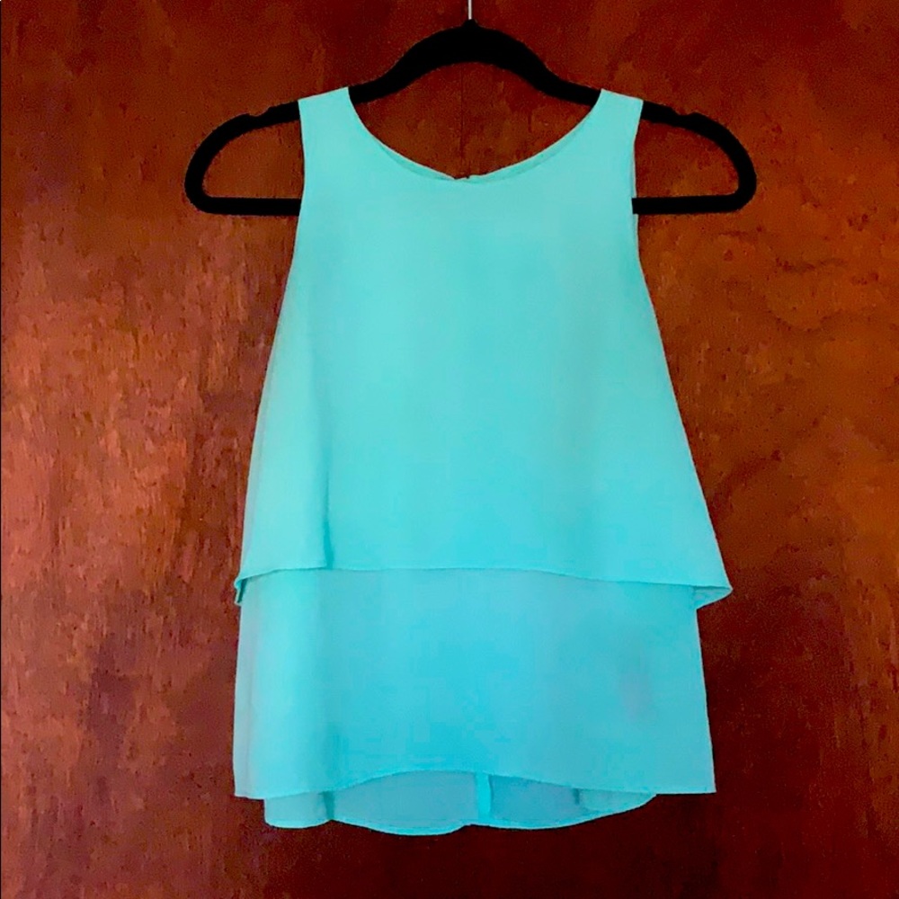 Layered sea form green sleeveless blouse